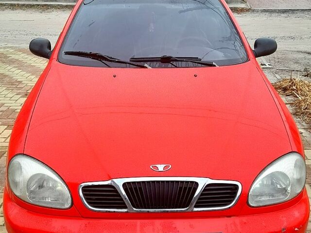 Красный Дэу Ланос, объемом двигателя 1.5 л и пробегом 181 тыс. км за 1999 $, фото 9 на Automoto.ua