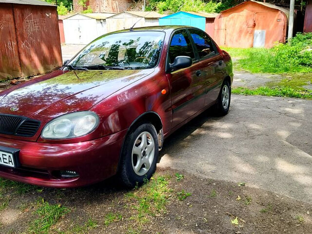 Красный Дэу Ланос, объемом двигателя 1.5 л и пробегом 213 тыс. км за 3000 $, фото 3 на Automoto.ua