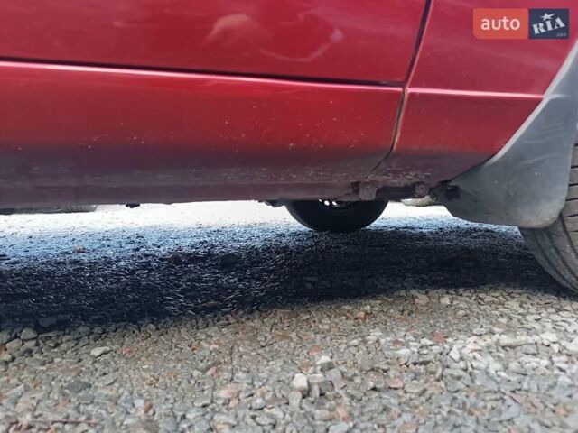 Красный Дэу Ланос, объемом двигателя 1.5 л и пробегом 135 тыс. км за 2450 $, фото 7 на Automoto.ua