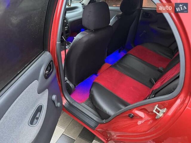Червоний Деу Ланос, об'ємом двигуна 1.5 л та пробігом 103 тис. км за 3950 $, фото 24 на Automoto.ua
