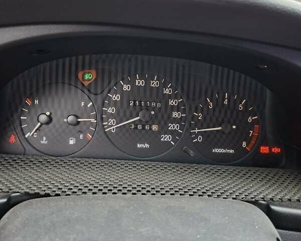 Красный Дэу Ланос, объемом двигателя 1.5 л и пробегом 211 тыс. км за 2800 $, фото 6 на Automoto.ua