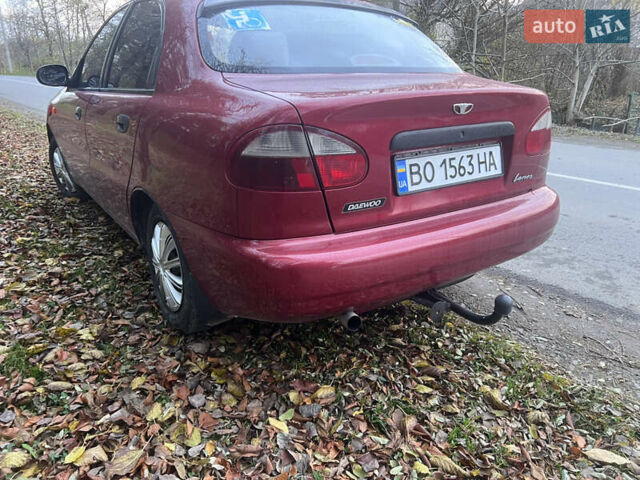 Красный Дэу Ланос, объемом двигателя 1.5 л и пробегом 205 тыс. км за 2200 $, фото 2 на Automoto.ua