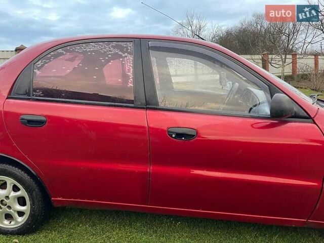 Червоний Деу Ланос, об'ємом двигуна 1.5 л та пробігом 320 тис. км за 1600 $, фото 4 на Automoto.ua