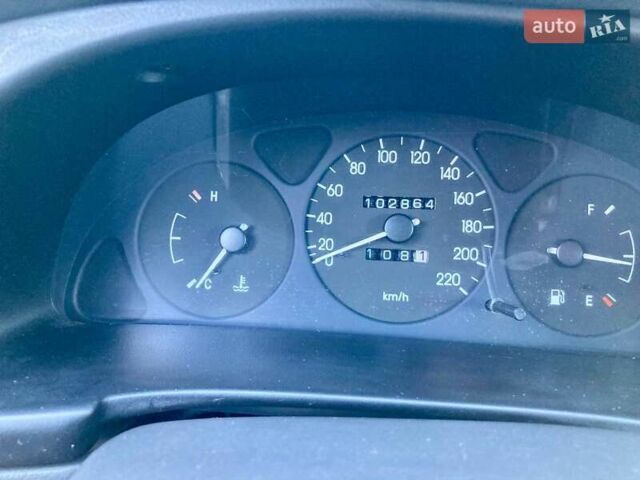 Красный Дэу Ланос, объемом двигателя 1.4 л и пробегом 103 тыс. км за 2700 $, фото 6 на Automoto.ua