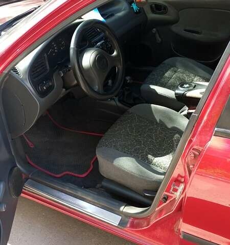 Красный Дэу Ланос, объемом двигателя 1.5 л и пробегом 185 тыс. км за 2800 $, фото 4 на Automoto.ua