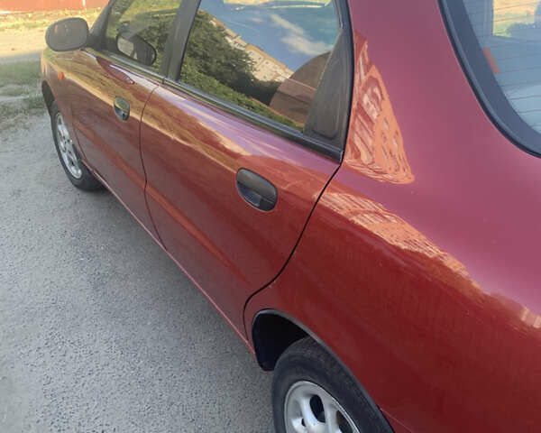 Красный Дэу Ланос, объемом двигателя 1.5 л и пробегом 144 тыс. км за 3000 $, фото 2 на Automoto.ua