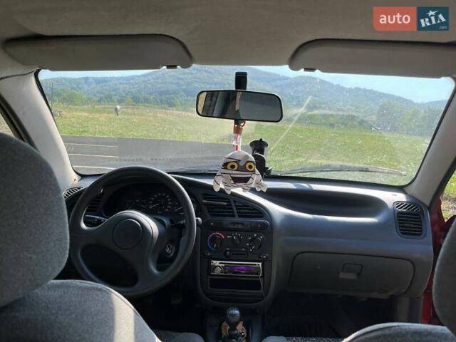 Дэу Ланос 2008 в Иршава на Automoto.ua Красный Дэу Ланос, объемом двигателя 1.5 л и пробегом 150 тыс. км за 3300 $, фото 1 на Automoto.ua