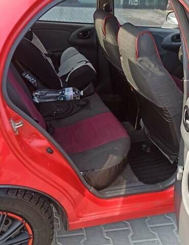 Красный Дэу Ланос, объемом двигателя 1.5 л и пробегом 437 тыс. км за 2150 $, фото 11 на Automoto.ua