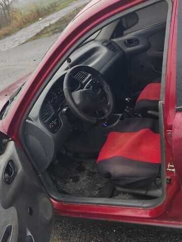 Красный Дэу Ланос, объемом двигателя 1.5 л и пробегом 270 тыс. км за 2200 $, фото 5 на Automoto.ua