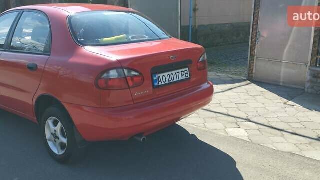 Красный Дэу Ланос, объемом двигателя 1.5 л и пробегом 302 тыс. км за 1800 $, фото 2 на Automoto.ua