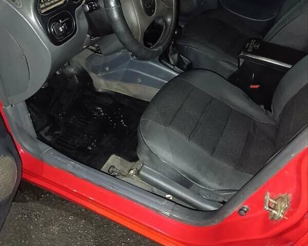 Красный Дэу Ланос, объемом двигателя 1.5 л и пробегом 257 тыс. км за 2000 $, фото 4 на Automoto.ua