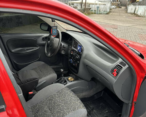 Красный Дэу Ланос, объемом двигателя 1.5 л и пробегом 174 тыс. км за 2700 $, фото 5 на Automoto.ua