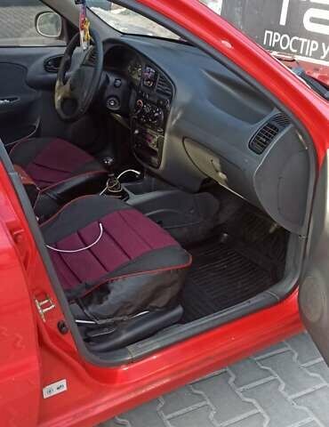 Красный Дэу Ланос, объемом двигателя 1.5 л и пробегом 437 тыс. км за 2150 $, фото 10 на Automoto.ua