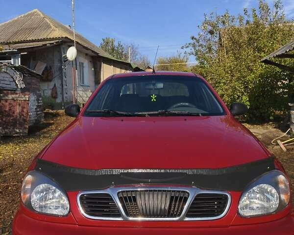 Красный Дэу Ланос, объемом двигателя 1.5 л и пробегом 170 тыс. км за 2200 $, фото 4 на Automoto.ua