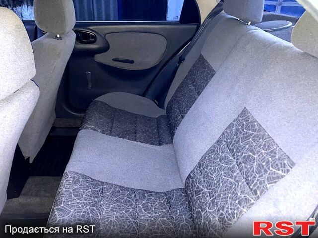 Красный Дэу Ланос, объемом двигателя 1.6 л и пробегом 155 тыс. км за 4000 $, фото 10 на Automoto.ua