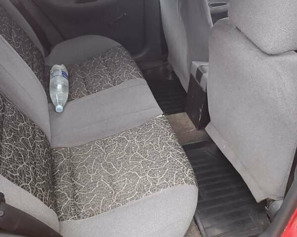 Красный Дэу Ланос, объемом двигателя 1.5 л и пробегом 210 тыс. км за 1800 $, фото 3 на Automoto.ua