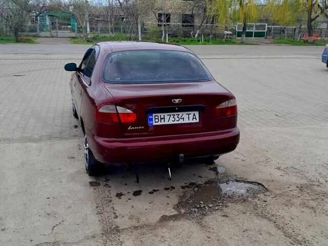 Красный Дэу Ланос, объемом двигателя 1.5 л и пробегом 200 тыс. км за 1950 $, фото 3 на Automoto.ua