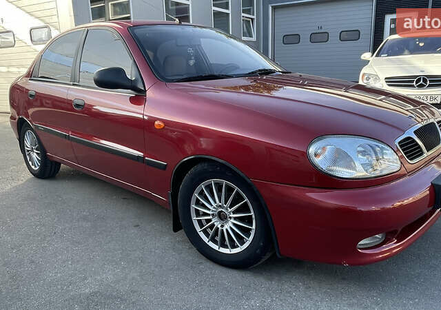 Красный Дэу Ланос, объемом двигателя 1.5 л и пробегом 148 тыс. км за 2600 $, фото 5 на Automoto.ua