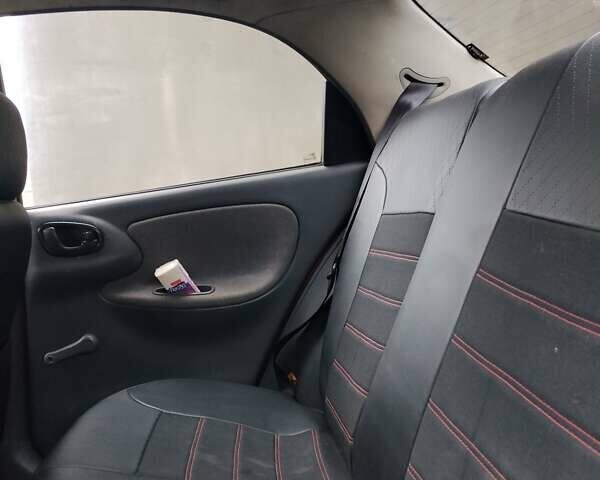 Красный Дэу Ланос, объемом двигателя 1.5 л и пробегом 330 тыс. км за 1400 $, фото 1 на Automoto.ua