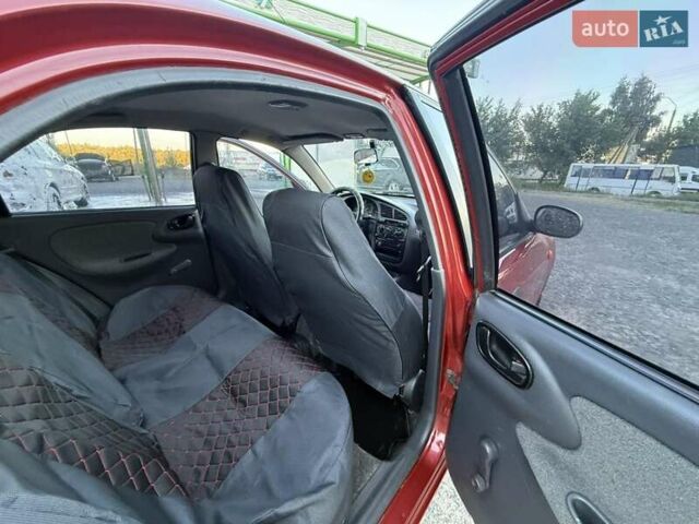 Червоний Деу Ланос, об'ємом двигуна 1.5 л та пробігом 210 тис. км за 2250 $, фото 12 на Automoto.ua