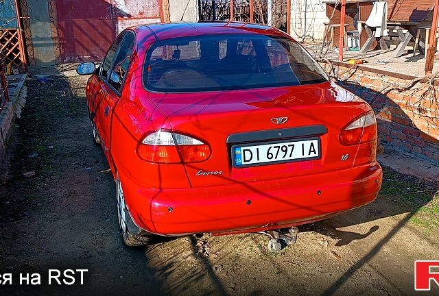 Красный Дэу Ланос, объемом двигателя 1.4 л и пробегом 161 тыс. км за 3000 $, фото 2 на Automoto.ua