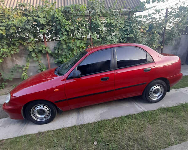 Червоний Деу Ланос, об'ємом двигуна 1.6 л та пробігом 160 тис. км за 2600 $, фото 2 на Automoto.ua