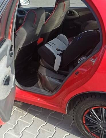 Красный Дэу Ланос, объемом двигателя 1.5 л и пробегом 437 тыс. км за 2150 $, фото 2 на Automoto.ua