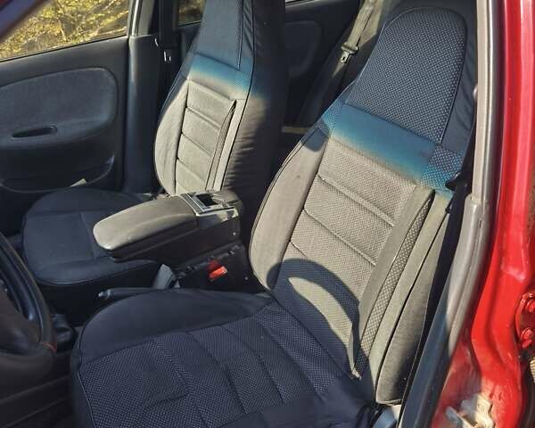 Красный Дэу Ланос, объемом двигателя 1.5 л и пробегом 170 тыс. км за 2200 $, фото 3 на Automoto.ua