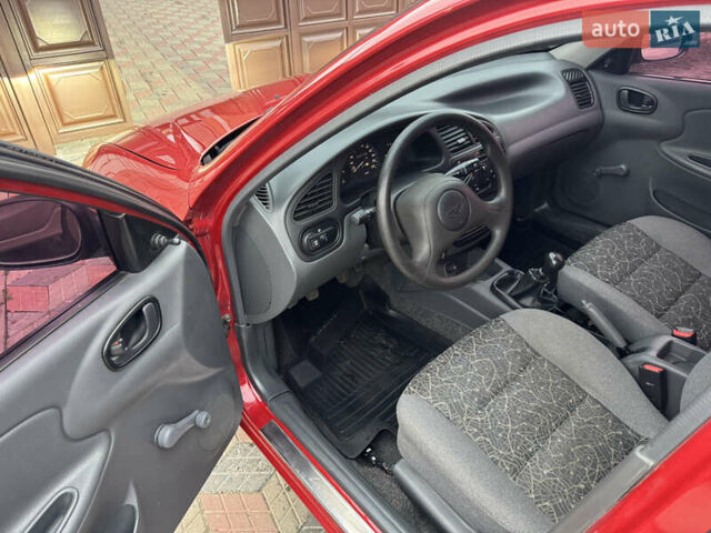 Красный Дэу Ланос, объемом двигателя 1.4 л и пробегом 44 тыс. км за 3700 $, фото 10 на Automoto.ua