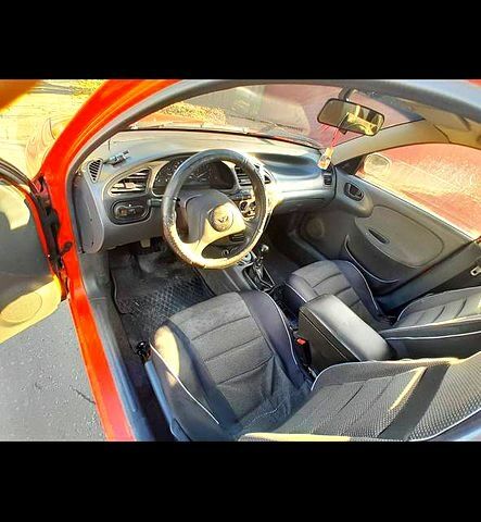 Красный Дэу Ланос, объемом двигателя 1.5 л и пробегом 181 тыс. км за 1999 $, фото 2 на Automoto.ua