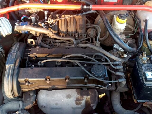 Красный Дэу Ланос, объемом двигателя 1.6 л и пробегом 507 тыс. км за 1300 $, фото 8 на Automoto.ua