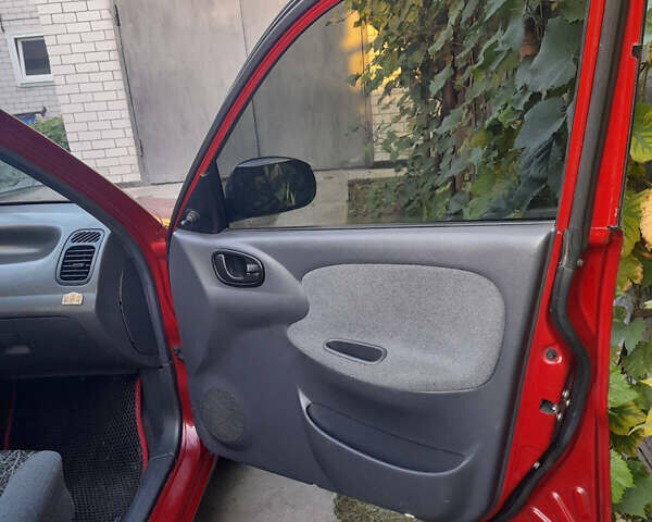 Червоний Деу Ланос, об'ємом двигуна 1.6 л та пробігом 160 тис. км за 2600 $, фото 7 на Automoto.ua