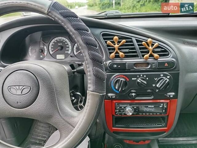 Красный Дэу Ланос, объемом двигателя 1.5 л и пробегом 253 тыс. км за 2900 $, фото 9 на Automoto.ua