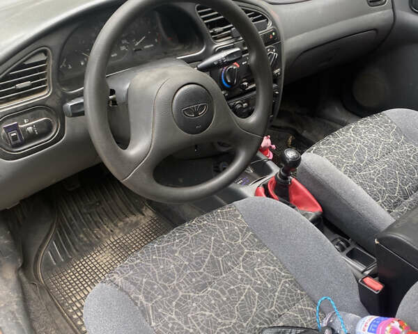Красный Дэу Ланос, объемом двигателя 1.5 л и пробегом 212 тыс. км за 2250 $, фото 7 на Automoto.ua