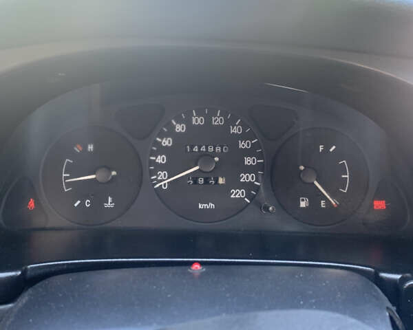 Красный Дэу Ланос, объемом двигателя 1.5 л и пробегом 144 тыс. км за 3000 $, фото 6 на Automoto.ua