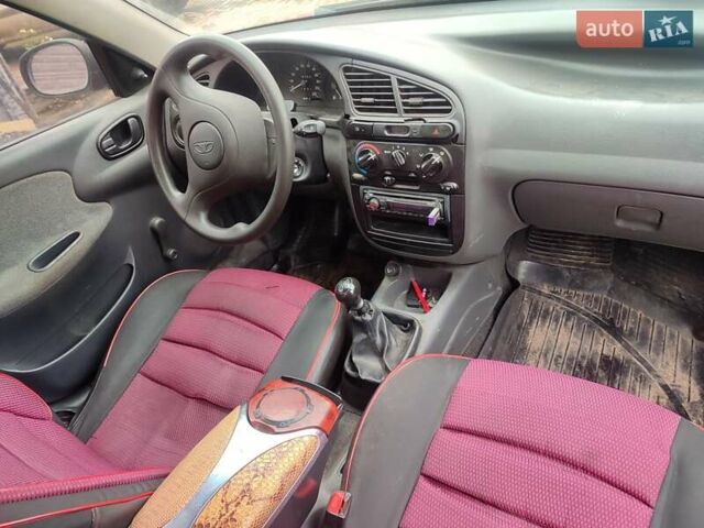 Красный Дэу Ланос, объемом двигателя 1.5 л и пробегом 197 тыс. км за 2400 $, фото 10 на Automoto.ua