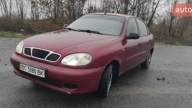 Красный Дэу Ланос, объемом двигателя 1.5 л и пробегом 270 тыс. км за 2200 $, фото 1 на Automoto.ua