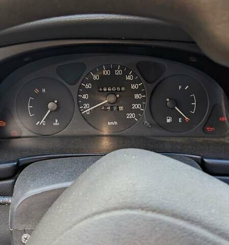 Красный Дэу Ланос, объемом двигателя 1.5 л и пробегом 180 тыс. км за 2000 $, фото 1 на Automoto.ua