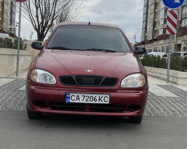 Красный Дэу Ланос, объемом двигателя 1.5 л и пробегом 242 тыс. км за 1999 $, фото 3 на Automoto.ua