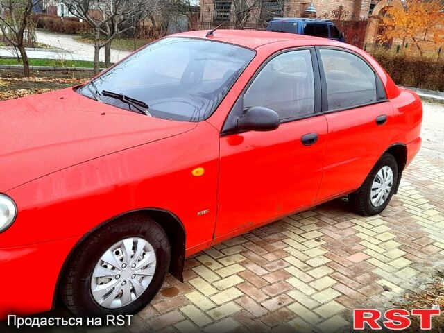 Красный Дэу Ланос, объемом двигателя 1.5 л и пробегом 181 тыс. км за 1999 $, фото 4 на Automoto.ua