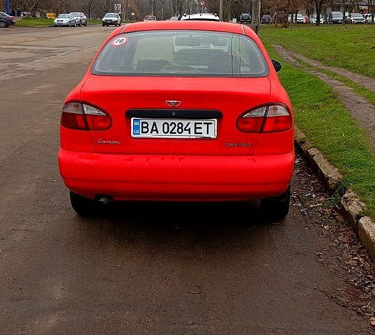 Червоний Деу Ланос, об'ємом двигуна 1.5 л та пробігом 0 тис. км за 2000 $, фото 6 на Automoto.ua