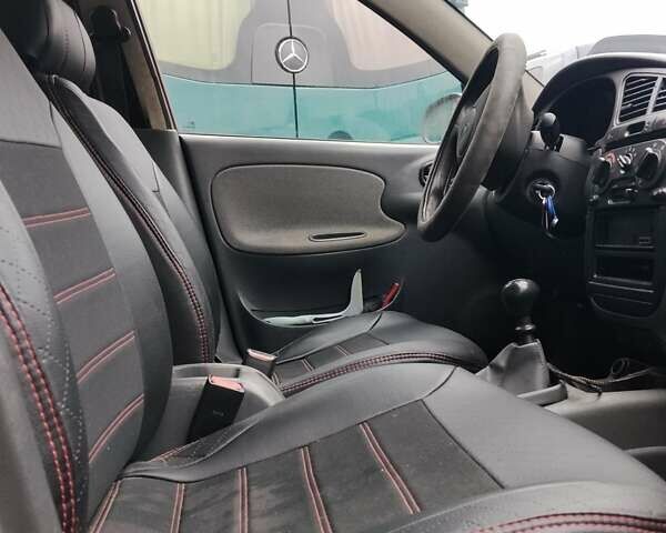 Красный Дэу Ланос, объемом двигателя 1.5 л и пробегом 330 тыс. км за 1400 $, фото 6 на Automoto.ua