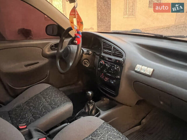 Красный Дэу Ланос, объемом двигателя 1.5 л и пробегом 205 тыс. км за 2200 $, фото 11 на Automoto.ua