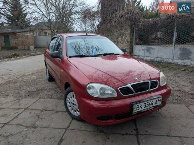 Красный Дэу Ланос, объемом двигателя 1.4 л и пробегом 156 тыс. км за 1950 $, фото 3 на Automoto.ua