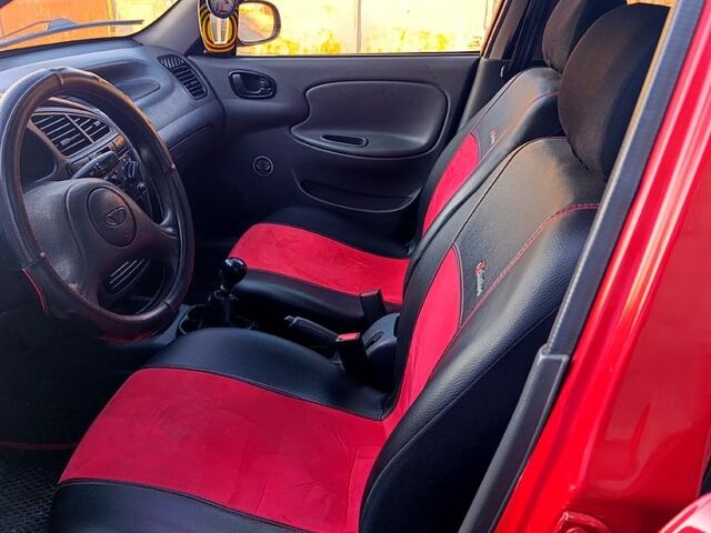 Красный Дэу Ланос, объемом двигателя 1.4 л и пробегом 130 тыс. км за 3300 $, фото 5 на Automoto.ua