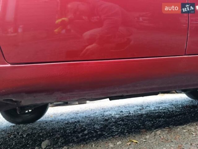 Красный Дэу Ланос, объемом двигателя 1.5 л и пробегом 135 тыс. км за 2450 $, фото 6 на Automoto.ua