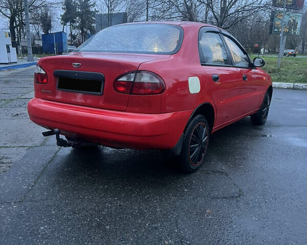 Красный Дэу Ланос, объемом двигателя 1.5 л и пробегом 175 тыс. км за 2500 $, фото 5 на Automoto.ua