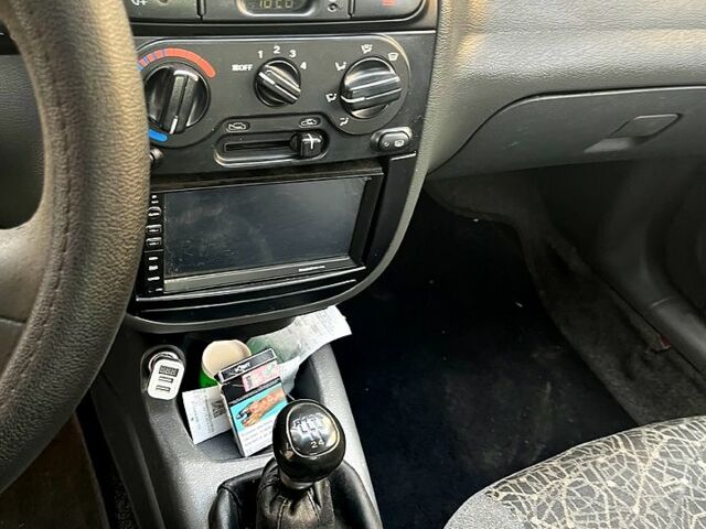 Красный Дэу Ланос, объемом двигателя 1.5 л и пробегом 0 тыс. км за 2700 $, фото 4 на Automoto.ua