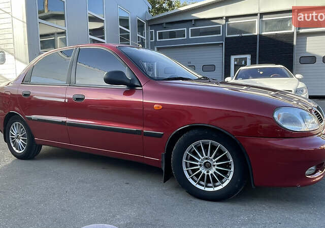 Красный Дэу Ланос, объемом двигателя 1.5 л и пробегом 148 тыс. км за 2600 $, фото 7 на Automoto.ua