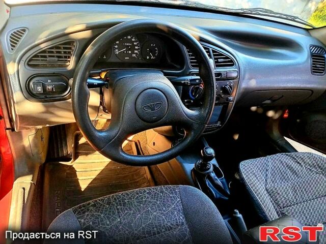 Червоний Деу Ланос, об'ємом двигуна 1.5 л та пробігом 112 тис. км за 1900 $, фото 4 на Automoto.ua